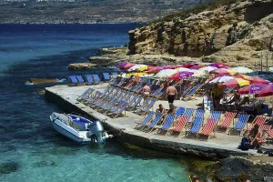Holidaymakers in deckchairs, Blue Lagoon