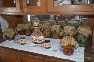Home harvesting vegetables in jars