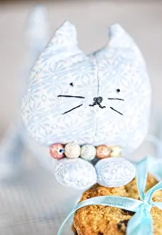 Framed Print : Homemade puppet, a cat and cookie on tablecloth Framed Print : Homemade puppet, a cat and cookie on tablecloth