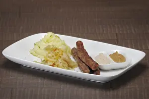 Homemade sausage with mashed potato and sauerkraut
