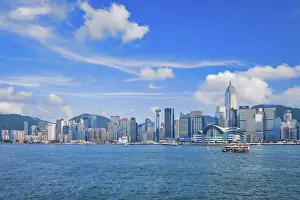 HONG KONG, CHINA, MAY 1, 2018: Hong Kong skyline cityscape downtown skyscrapers over Victoria Harbour on sunset