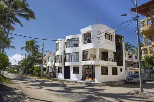 Hotel, Antonio Gil street, dirt road with palm trees