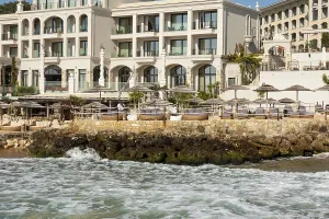 Hotel Villa Chinka and beach in summer