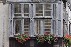 House facade with window, half-timbered house in the old town of Dinan