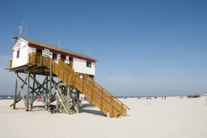 House on stilts on the beach, North Sea resort St