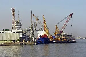 Category Historic EN Prints: Huge cranes cargo ships on the mumbai port trust