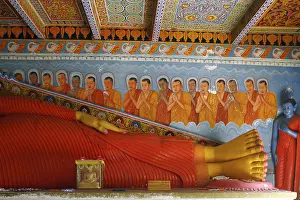Huge recline statue of Buddha and fresco in world heritage site