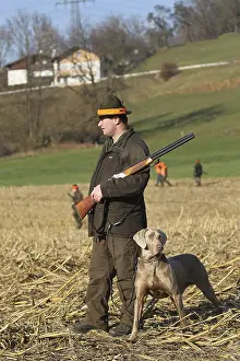 Hunter with red hatband