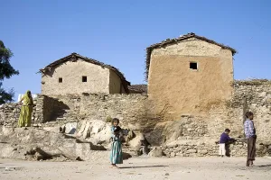 Two huts, tribal people in Bheel basti