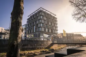 Ibis Styles Hotel, Modern architecture with reflection in a puddle