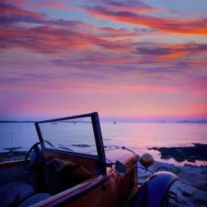 Ibiza sunset view from vintage car at formentera Island in Balearic Islands