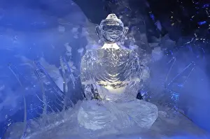 Category Buddhism Prints: Ice Buddha statue in an ice cave in the Gletscherpalast or Glacier Palace