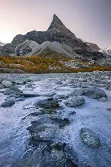 Framed Print : Ice structures on mountain stream with autumnal larches and mountain views Framed Print : Ice structures on mountain stream with autumnal larches and mountain views