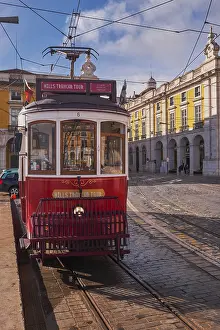 The Iconic and Famous Red Vintage Tram in Terreiro do Paco