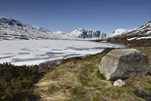 Icy lake in the mountains of Norway