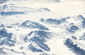 Icy, snowy arctic mountain landscape with glaciers