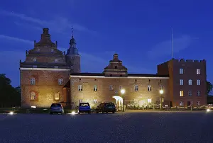 Illuminated castle in the evening light at blue hour
