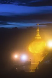 Illuminated Golden Rock at night with Kyaiktiyo Pagoda