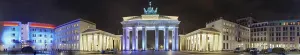 Illuminated Pariser Platz with Brandenburg Gate at night