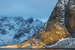 Category Mountain Landscapes Prints: Illuminated rock masiv at sunrise in Scandinavian landscape