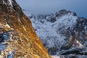 Category Mountain Landscapes Prints: Illuminated rock masiv at sunrise in Scandinavian landscape
