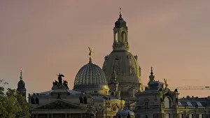 Illuminated skyline of Dresden in the evening light with the Frauenkirche