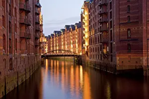 Illuminated warehouses and a channel