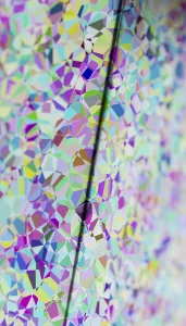 This image features a visually striking 3D rendered illustration of colorful