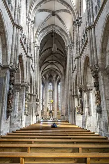An image of a man alone in the church
