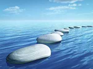 An image of some step stones in the blue sea
