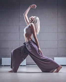 Image of a woman in yoga place