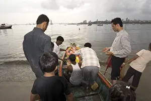 Category Historic EN Prints: Immersion ceremony of lord ganesh elephant headed god at Mahim beach