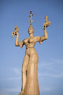 Imperia statue by sculptor Peter Lenk at the port entrance