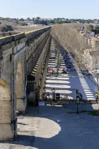 Imposing Aqueduc de Saint-Clement from 1766 in rue Aqueduc des Arceaux