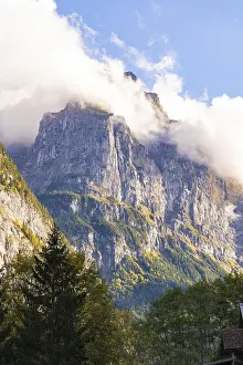 Impressive mountains shrouded in clouds