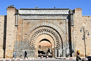 Impressive old oriental city gate Bab Agnaou medina Marrakech Morocco