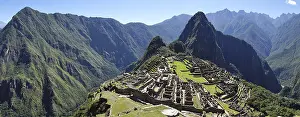 Inca ruined city with Mount Huayna Picchu