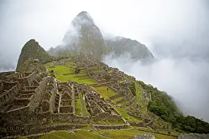 Inca ruins of Machu Picchu in the clouds