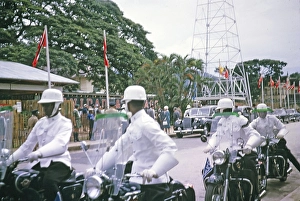 Independence Day, 31 August 1962, Port of Spain, Trinidad and Tobago, West Indies motorcycle cavalcade and cars for dignatories, Central America