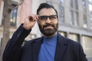 An Indian businessman in stylish winter attire