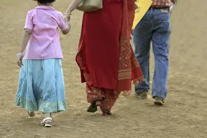 Indian mother and child walking at Shivaji park play ground