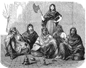 Indian woman at home in typical dress and with jewellery