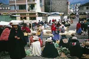 Indigenous market traders on the street, Ambato market, Ecuador, South America, 1962, South America