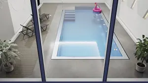 An indoor pool with a pink flamingo
