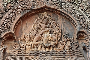 Indra, god of the sky, riding a chariot drawn by a three-headed elephant