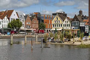 Inland harbour, beach bar and old town in Husum