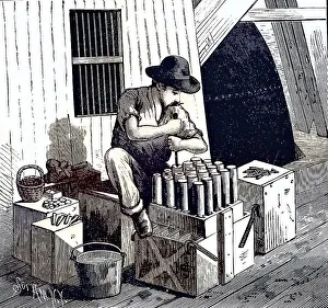 Inserting blasting caps into dynamite cartridges to blow up Flood Rock