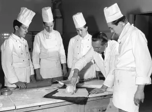 Instructor introduces apprentices to baking