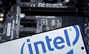 Category Historic EN Prints: Intel logo is displayed on smartphone