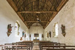 Interior view of a chapel with wooden ceiling